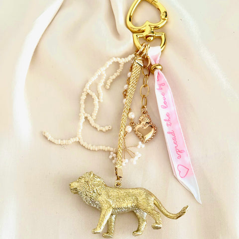 golden lion bag charm