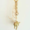 golden lion bag charm