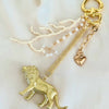 golden lion bag charm
