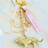 golden lion bag charm
