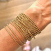 brede armband met geribbelde strengen - UITVERKOCHT